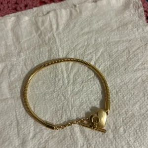 Pandora 14k gold plated bracelet with heart clasp