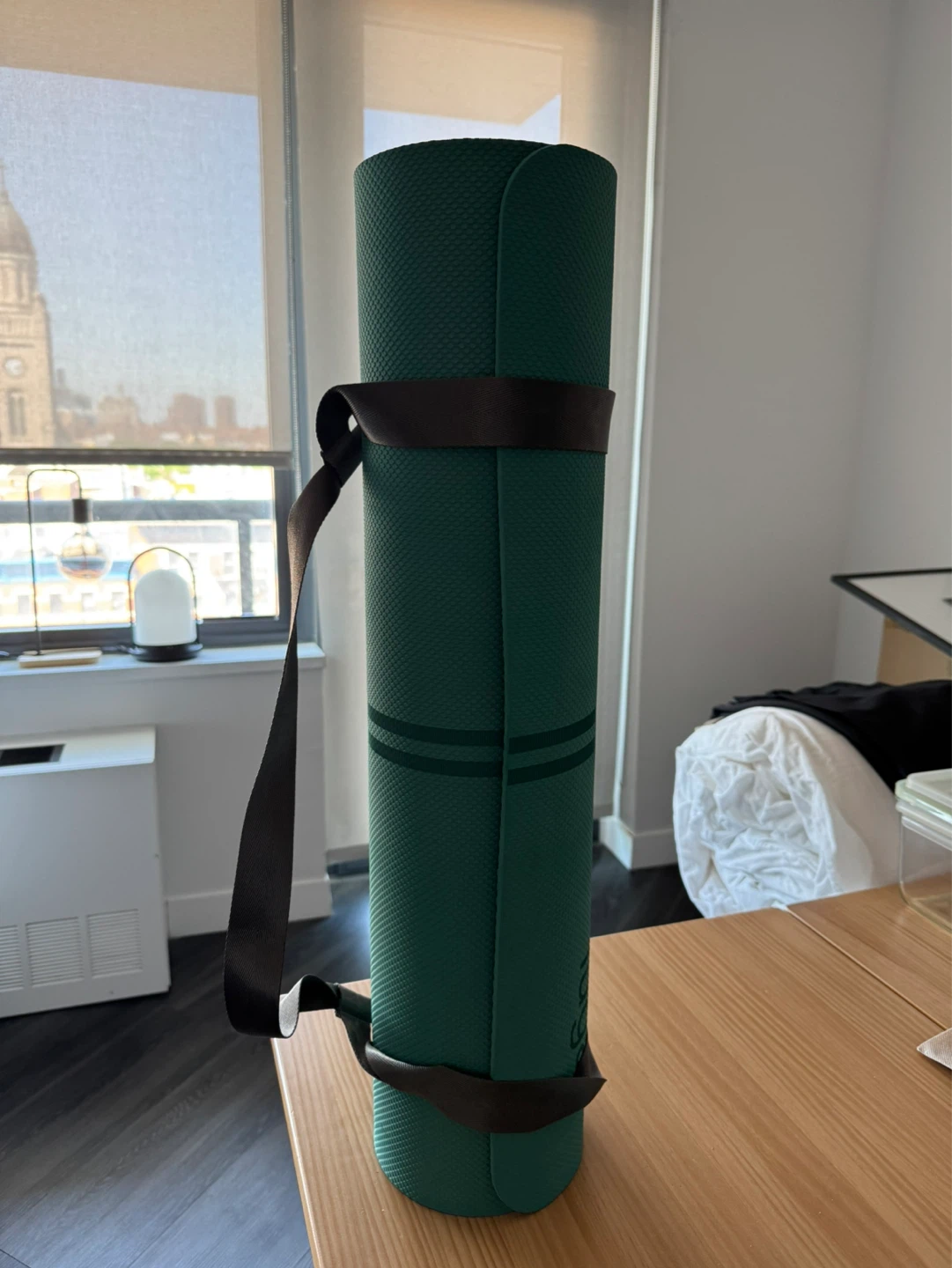 Teal Foam Roller and Green Yoga Mat with Strap