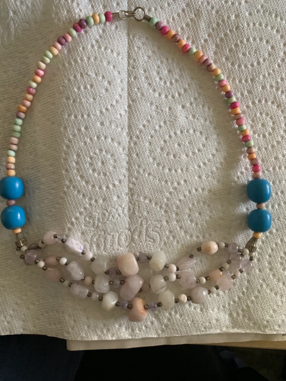 Multi-strand beaded necklace with blue accent beads