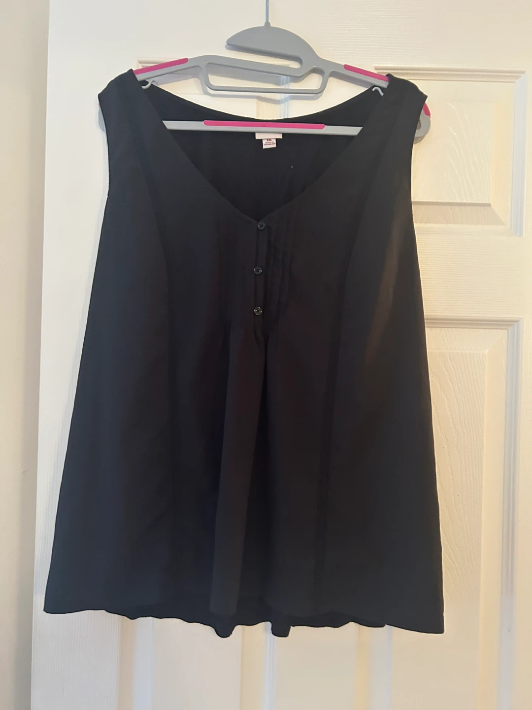Black sleeveless V-neck top