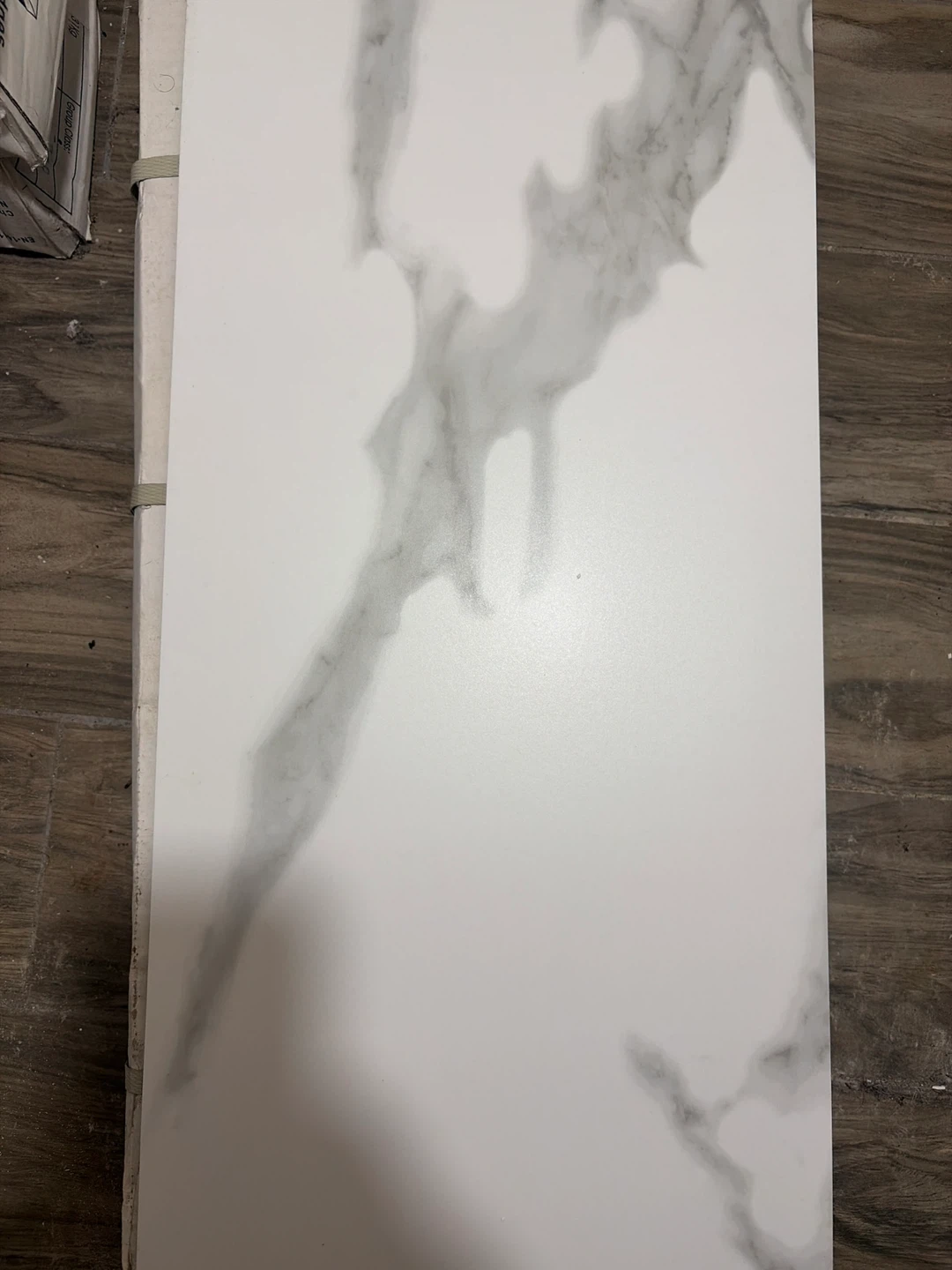 64 sq ft porcelain carrara X rectified edge tile