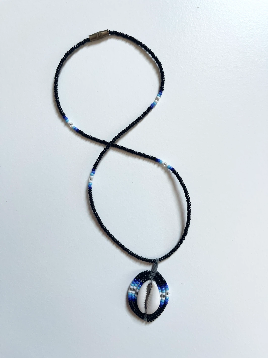 Beaded Necklace with Cowrie Shell Pendant