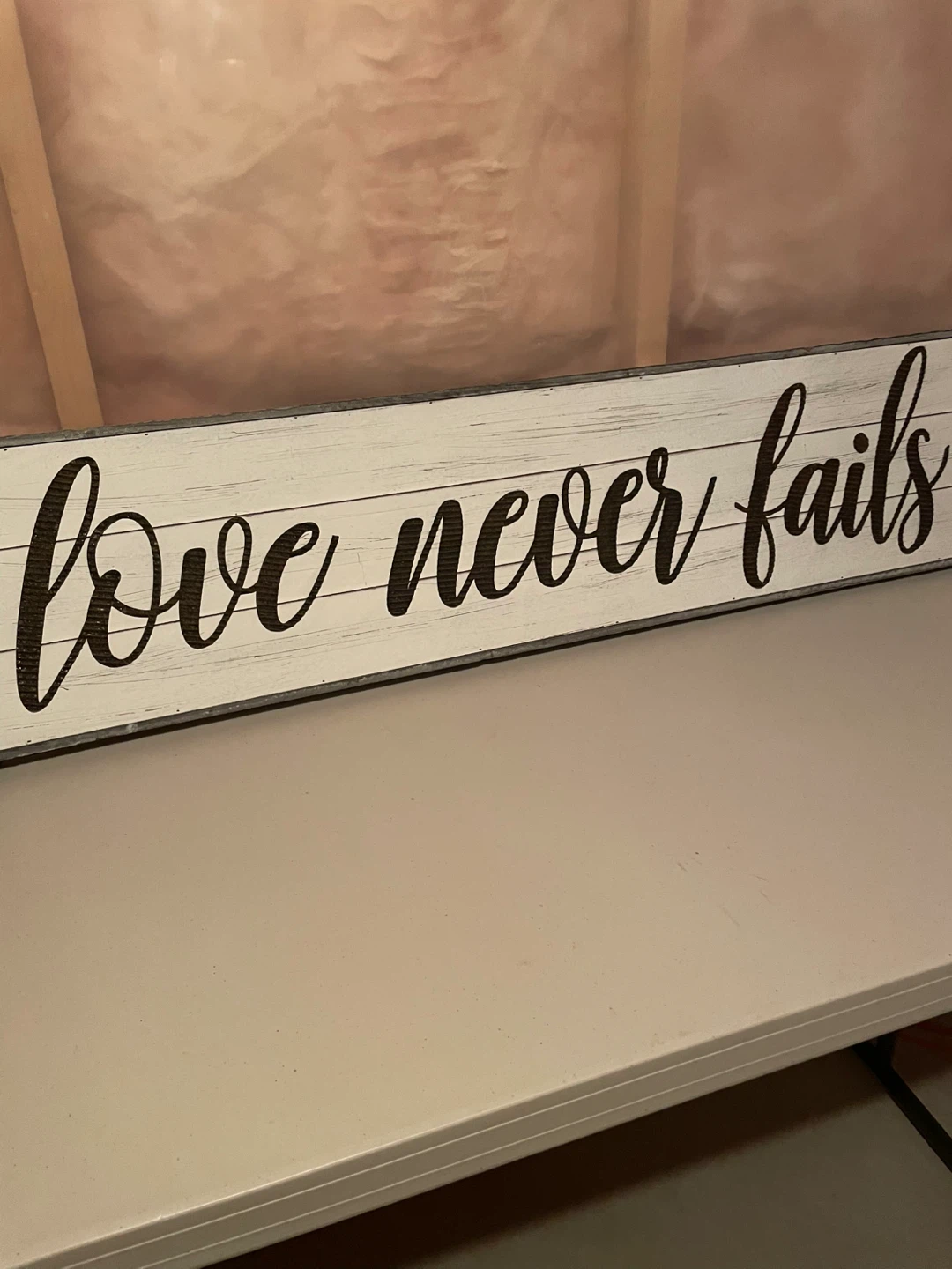 Love Never Fails Wood Sign