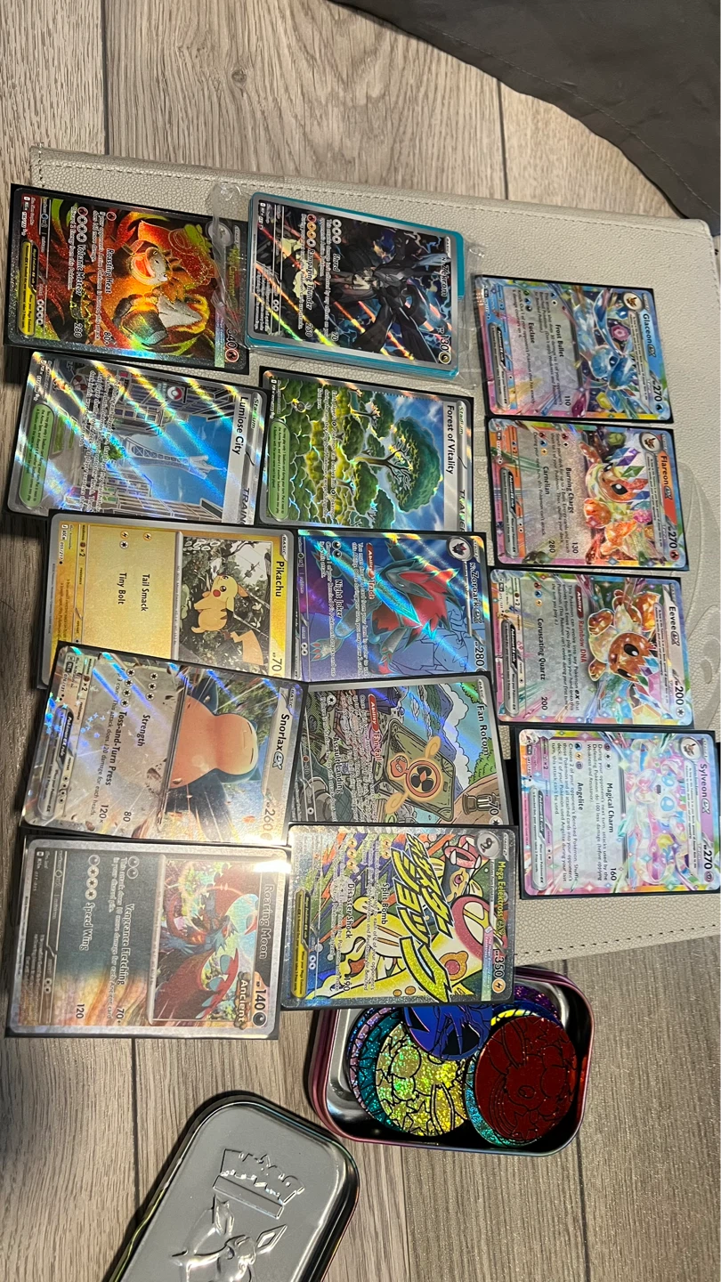 Pokemon Trading Cards, tins, coins, sleeves