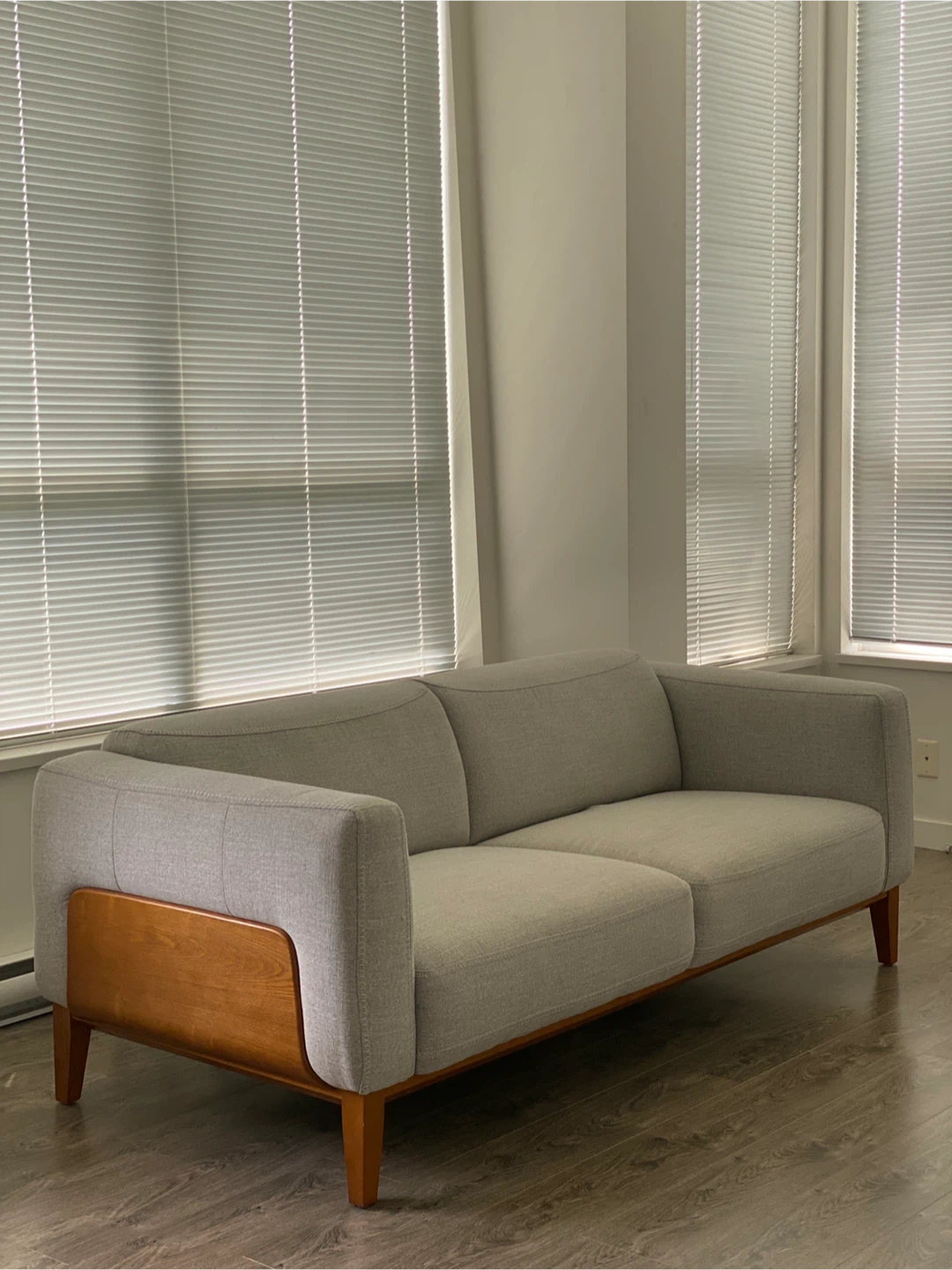 Grey Fabric Sofa with Wooden Accents