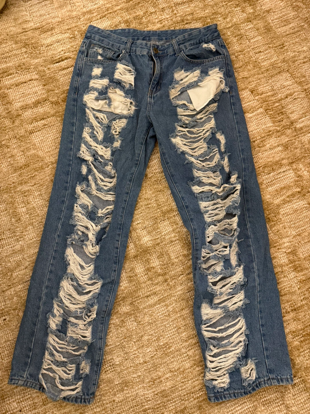 Distressed Blue Denim Jeans