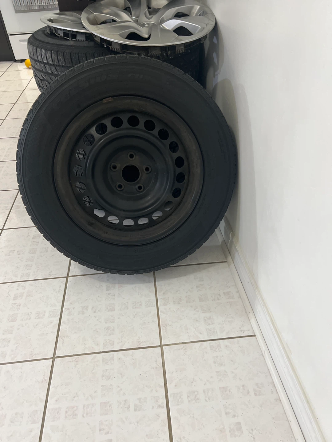 Set of 4 Toyota Hubcaps and Tires - photo 3