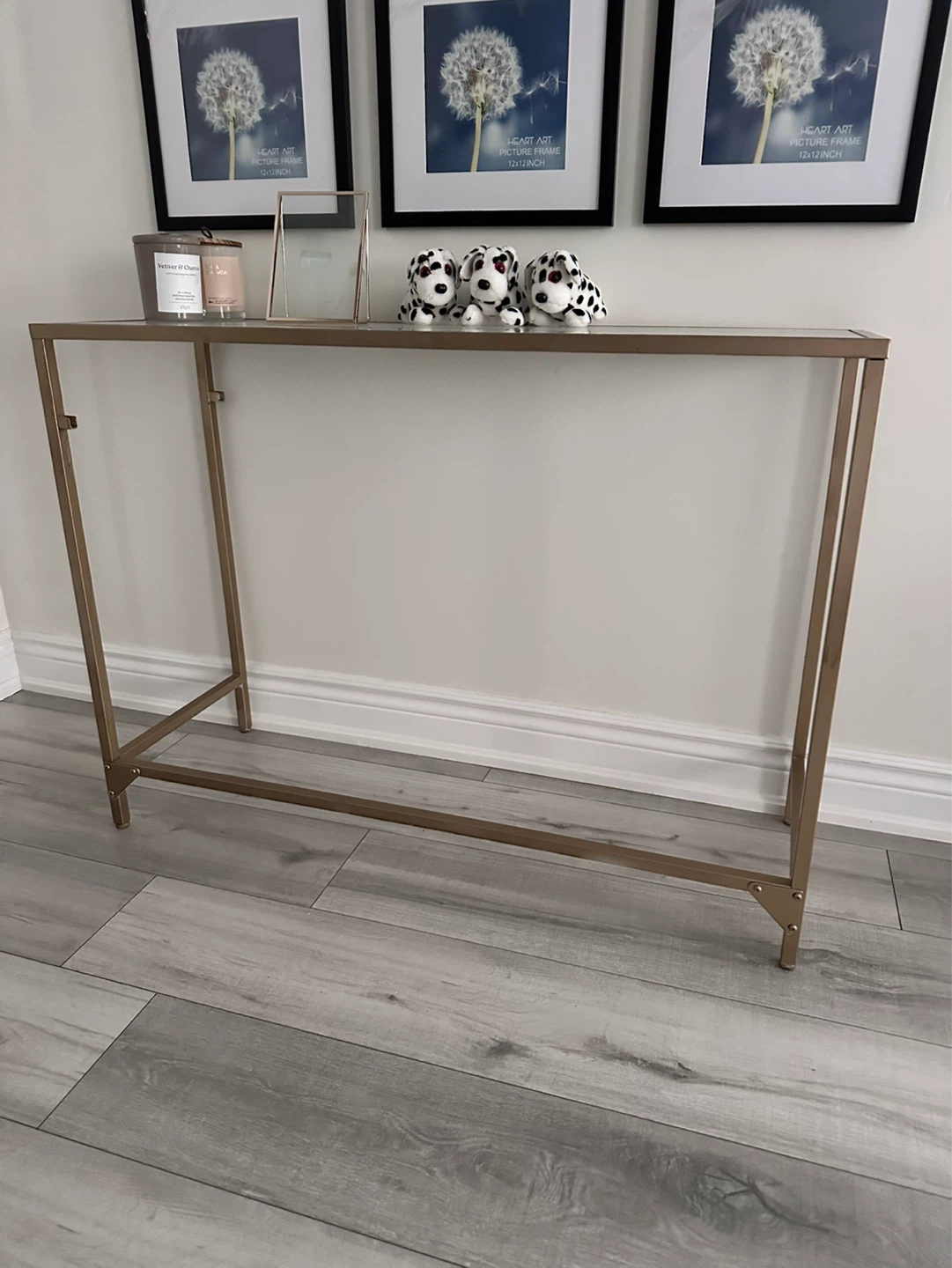 Glass top console table with gold frame