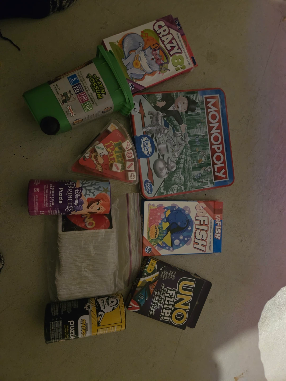 Bundle of various board games and puzzles