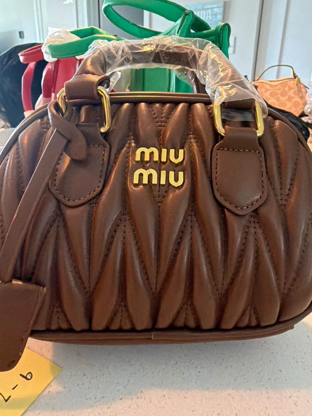 Miu Miu Quilted Leather Satchel Bag