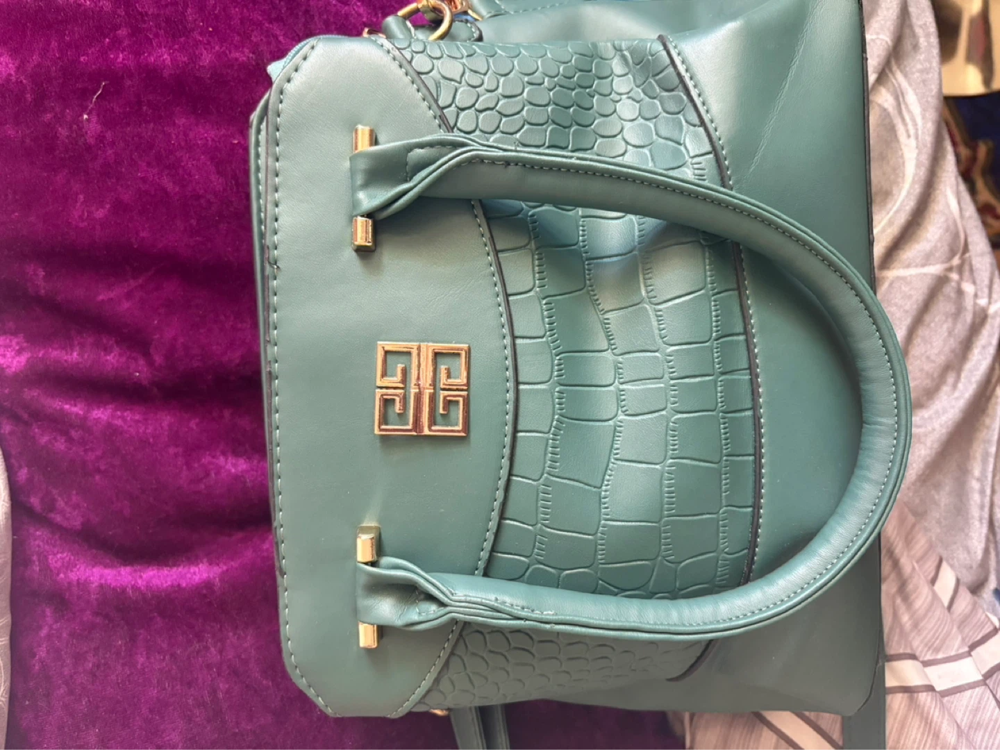 Teal Handbag with Gold Accents