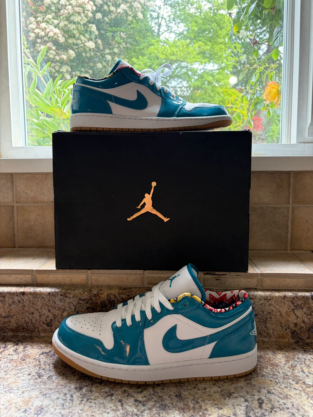 Air Jordan 1 Low Teal and White Sneakers