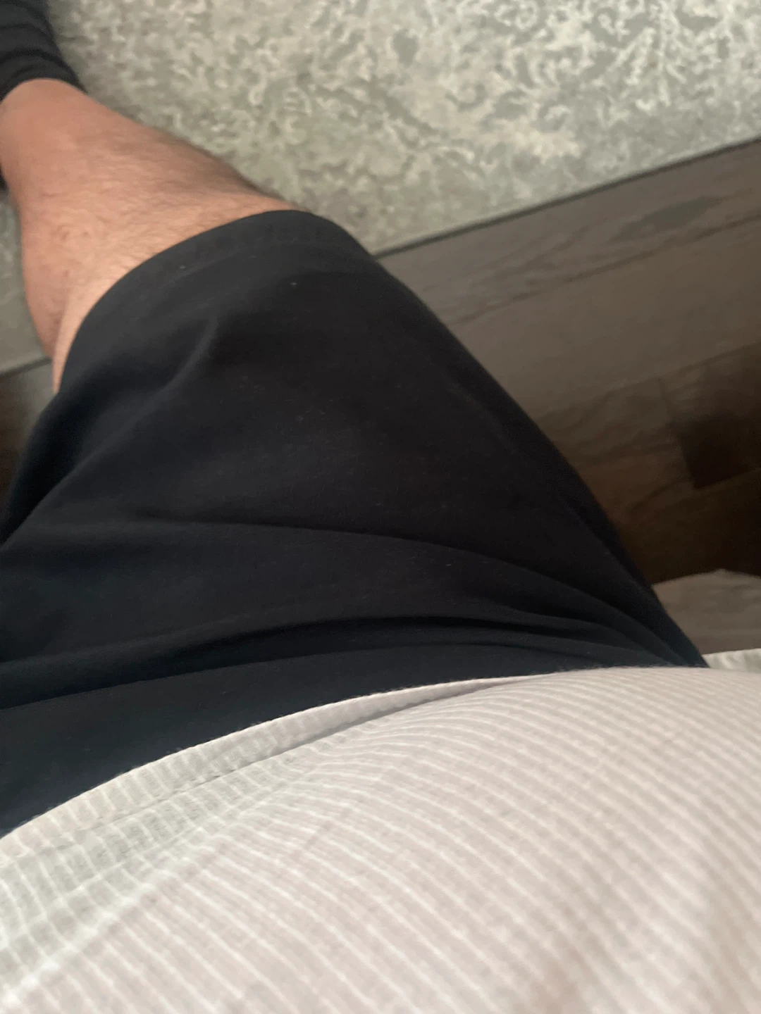 Black shorts with white pinstripe trim