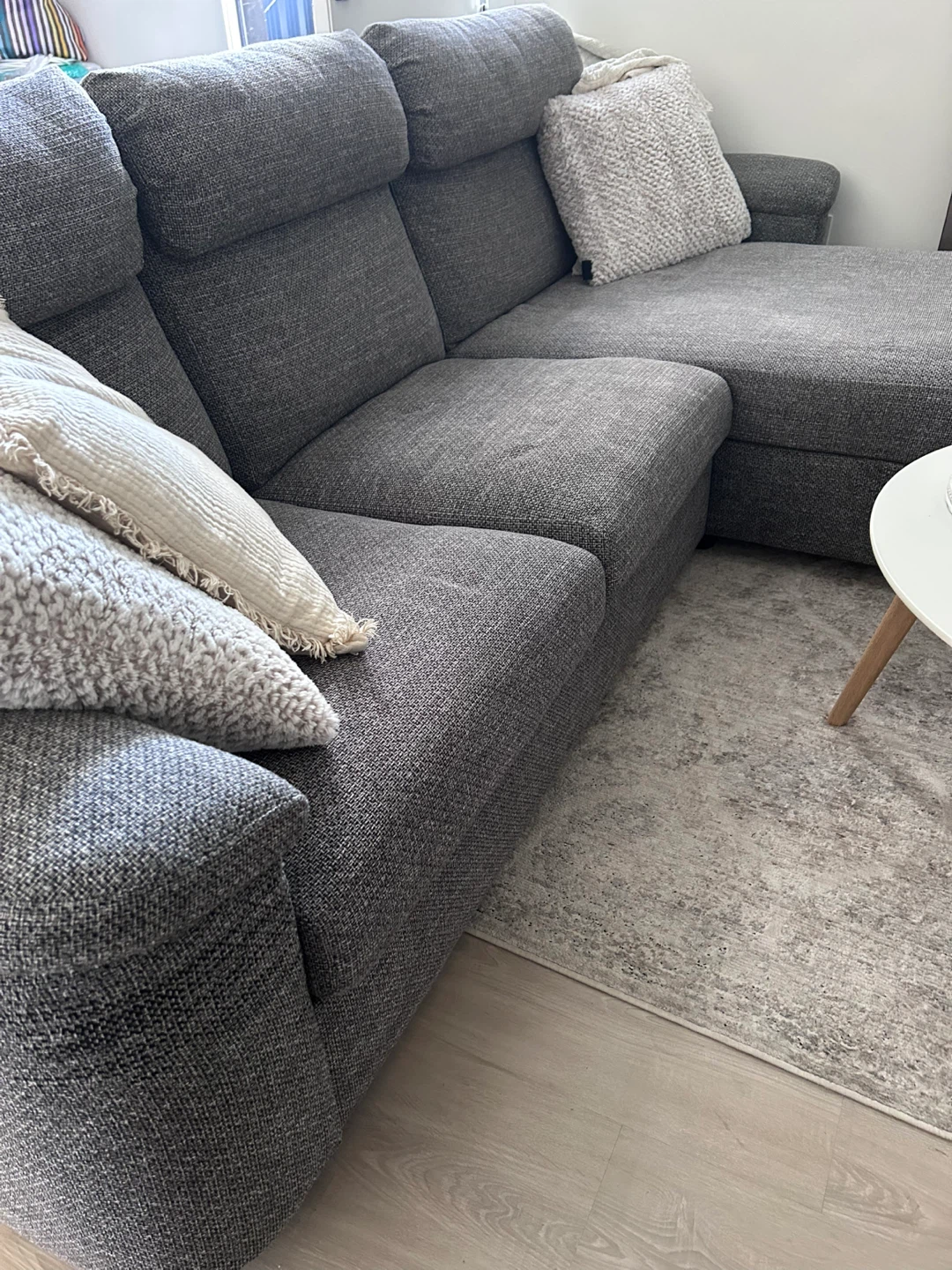 Grey sectional sofa with storage