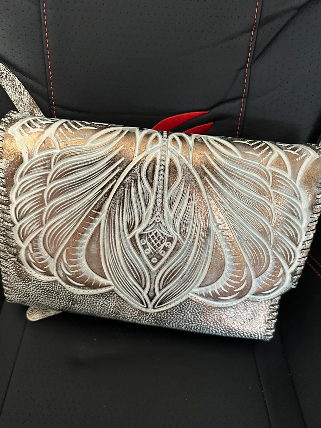 Patricia Nash crossbody bag with floral tooling