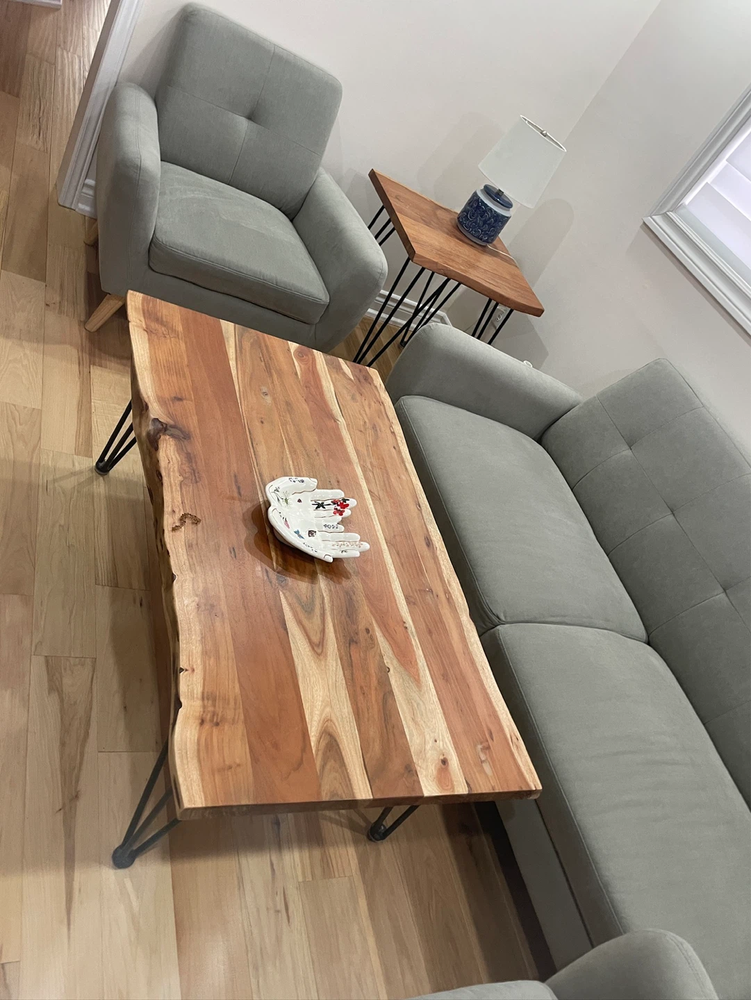 Living room set includes sofas and coffee table