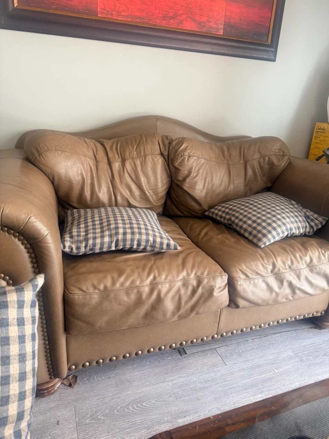 Brown Leather Loveseat with Studded Accents