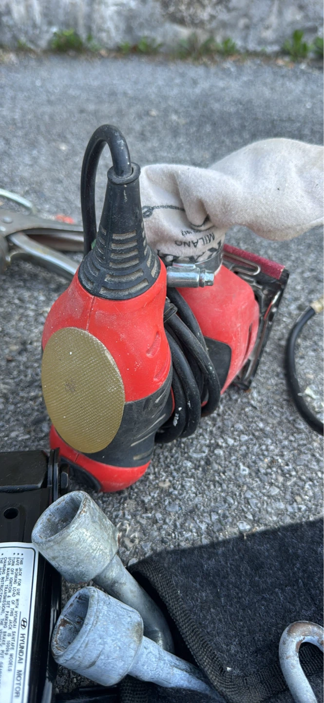 Red and Black Orbital Sander with Dust Bag