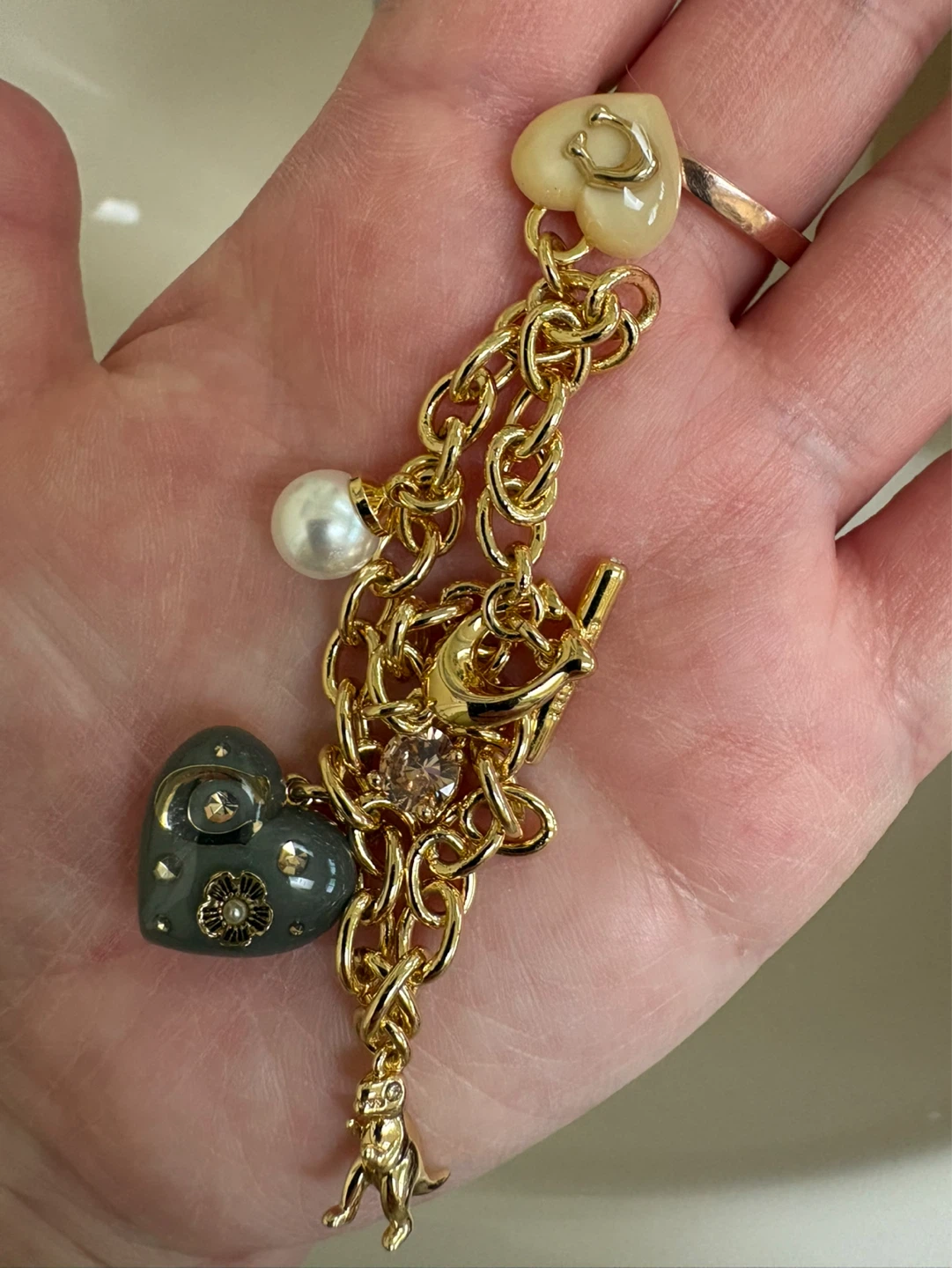 Gold Tone Charm Bracelet with Heart Charms and Pearl