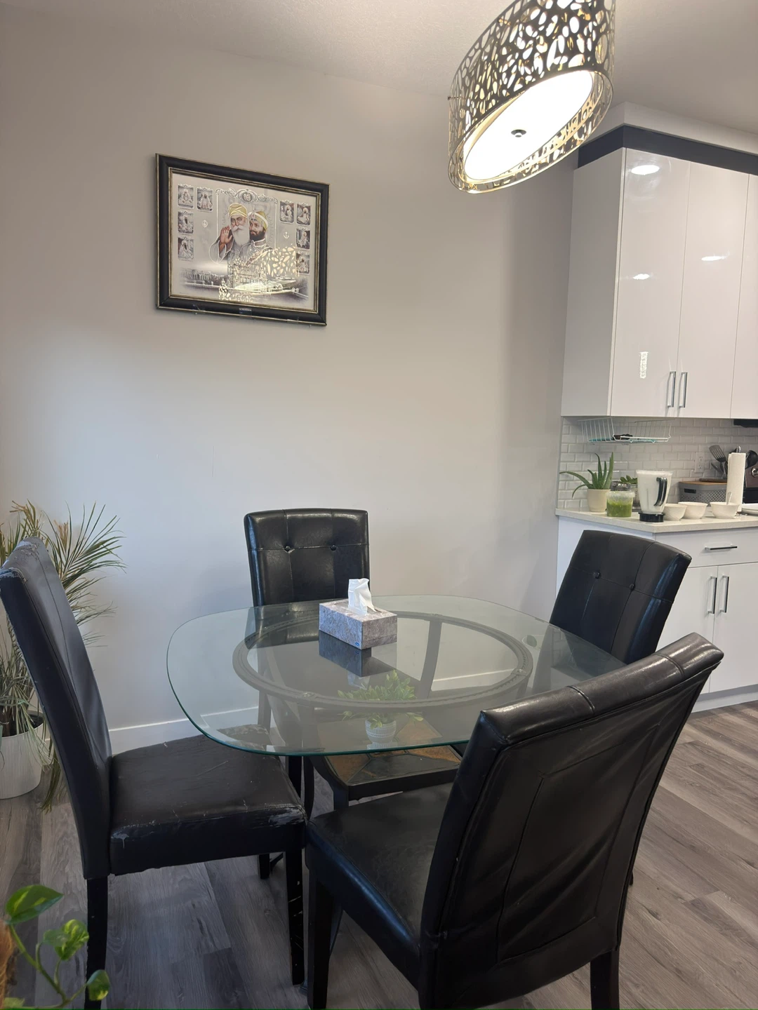 Glass Top Dining Table with 4 Black Chairs(free)