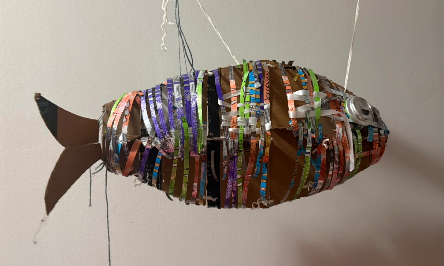 Fish made out of monster energy drink cans
