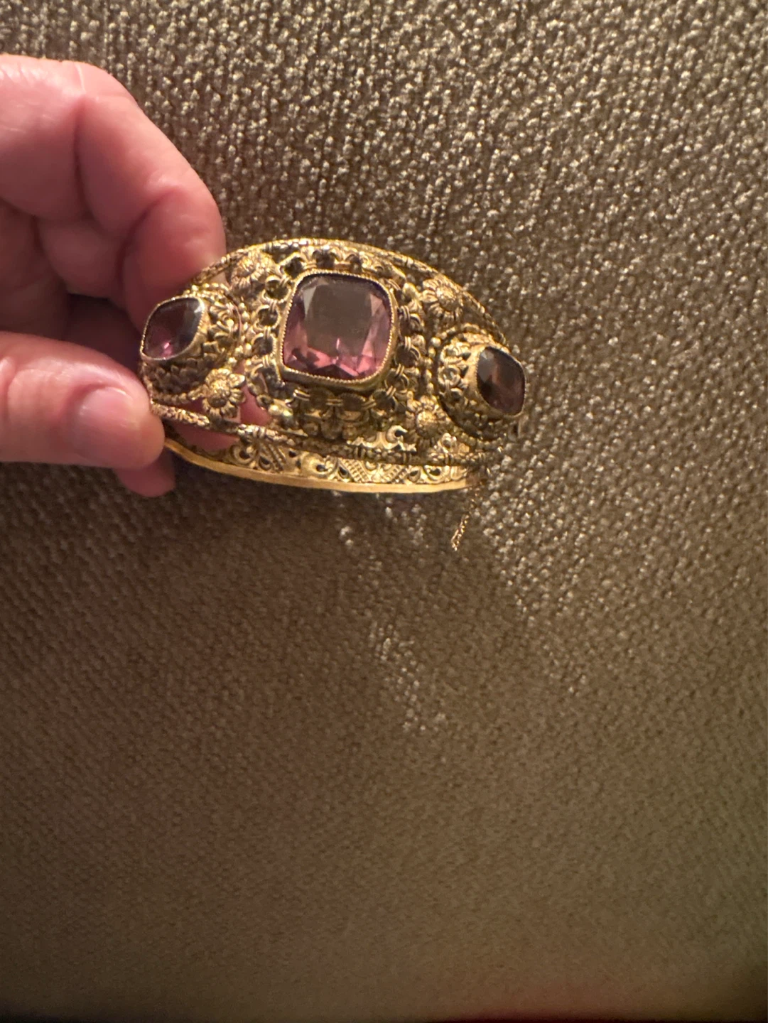 Ornate Gold Tone Bangle Bracelet with Purple Stones