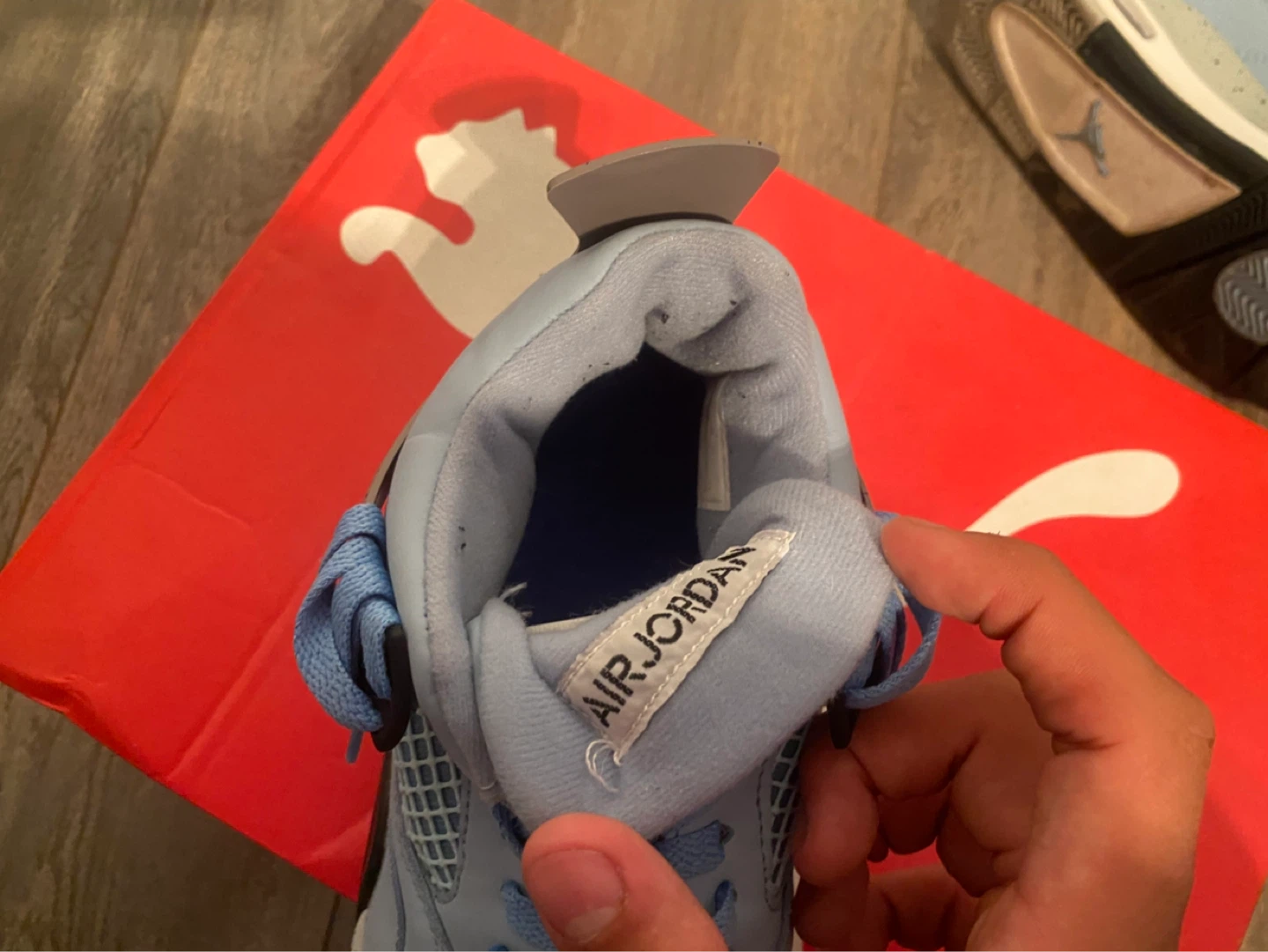 Air Jordan 4 'Light Blue' Sneakers - photo 2