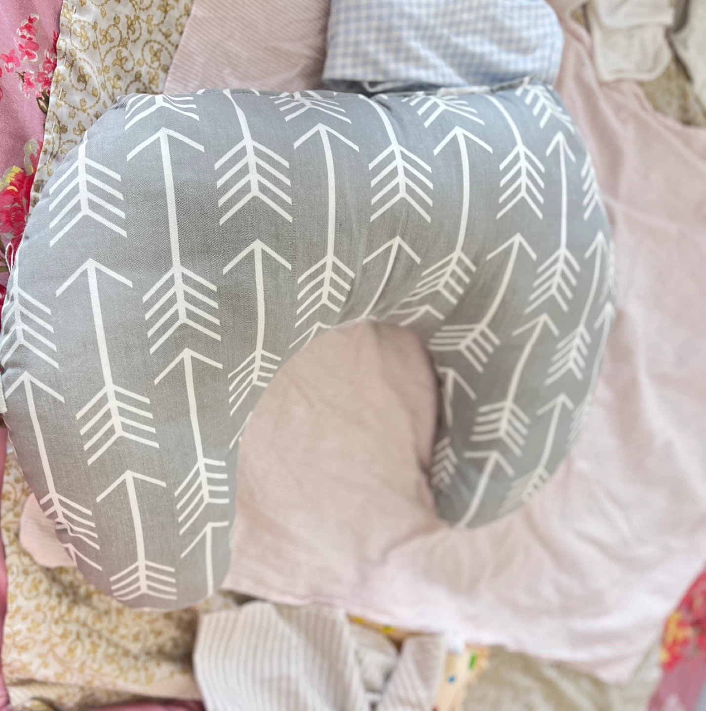 Grey and white arrow nursing pillow