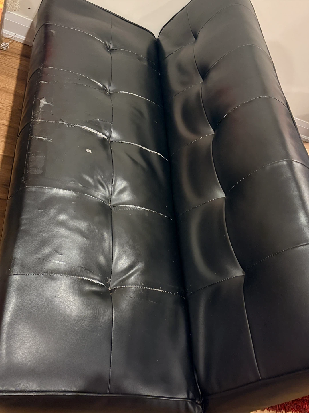 Black Faux Leather Futon Sofa Bed with blanket