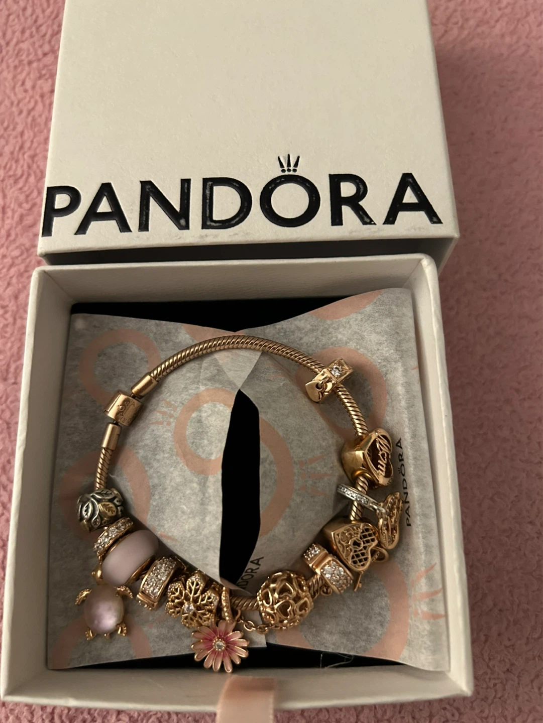 Pandora Rose Gold Charm Bracelet with Multiple Charms
