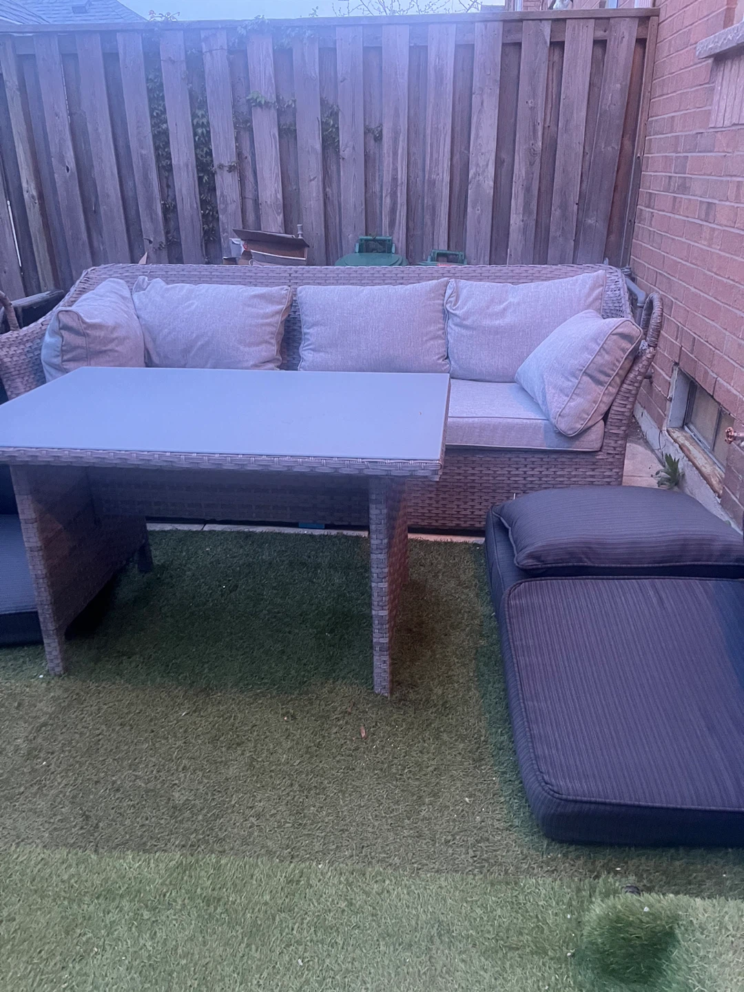 Wicker patio set with sofa and table