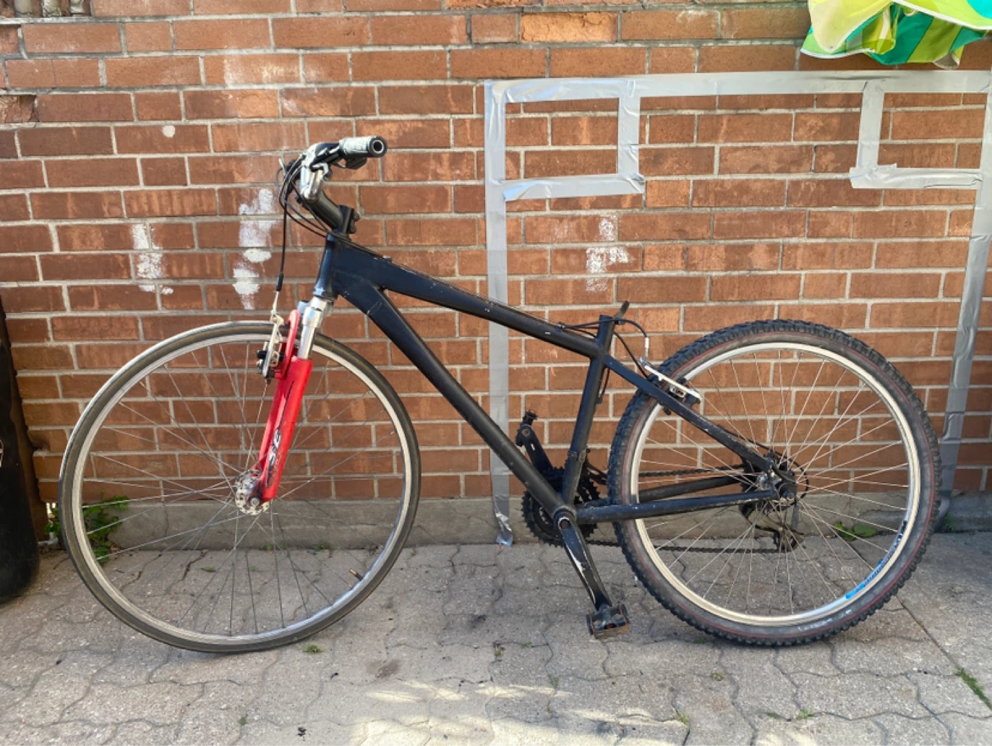 Black Mountain Bike Frame with Red Fork
