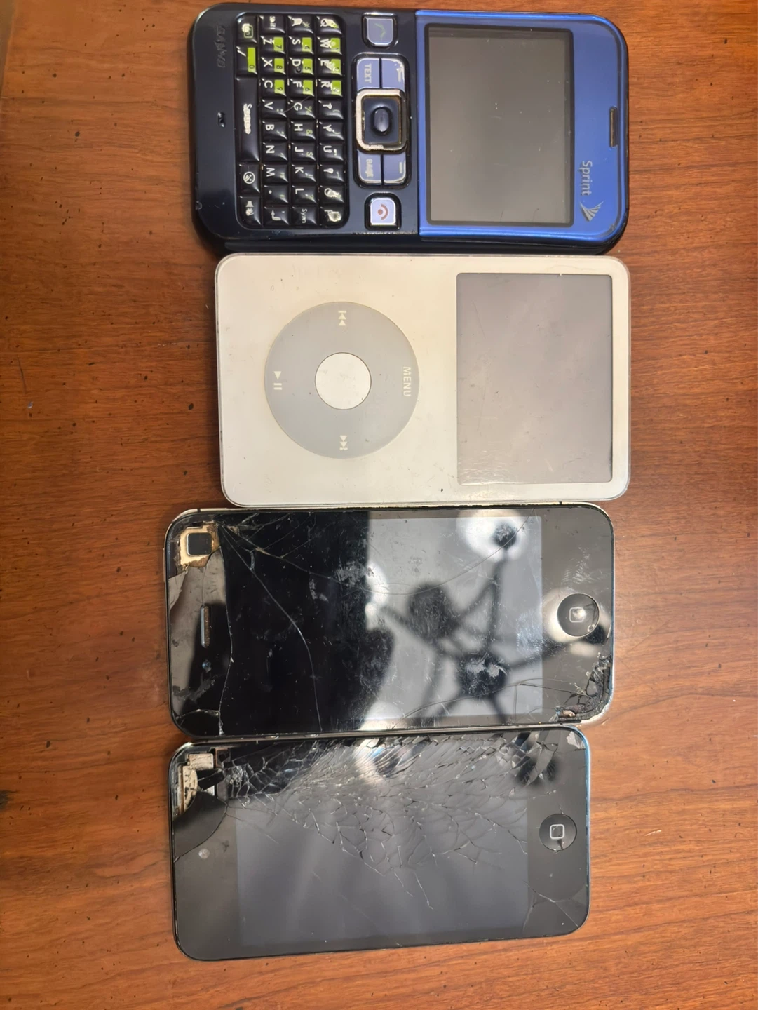 Sprint phone, iPods, and 2 iPhones - photo 2