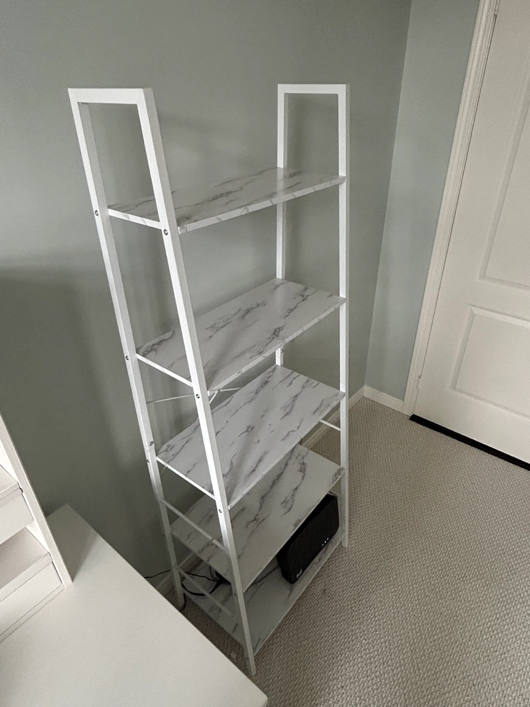 White Ladder Shelf with Marble Pattern Shelves