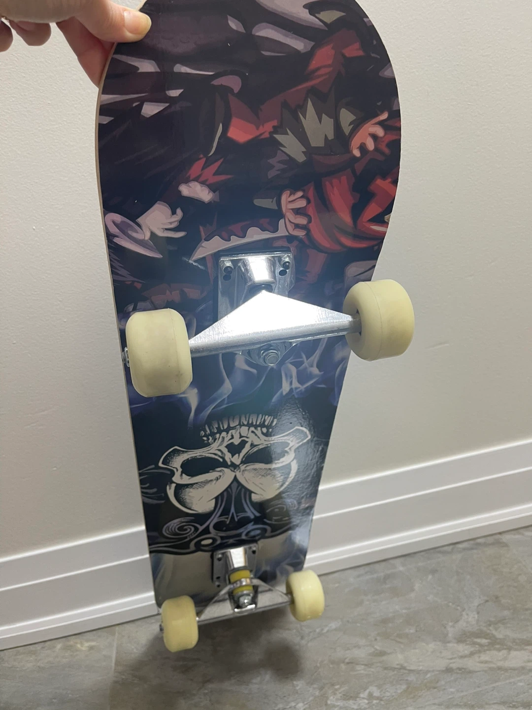 Skateboard with Skull Graphic