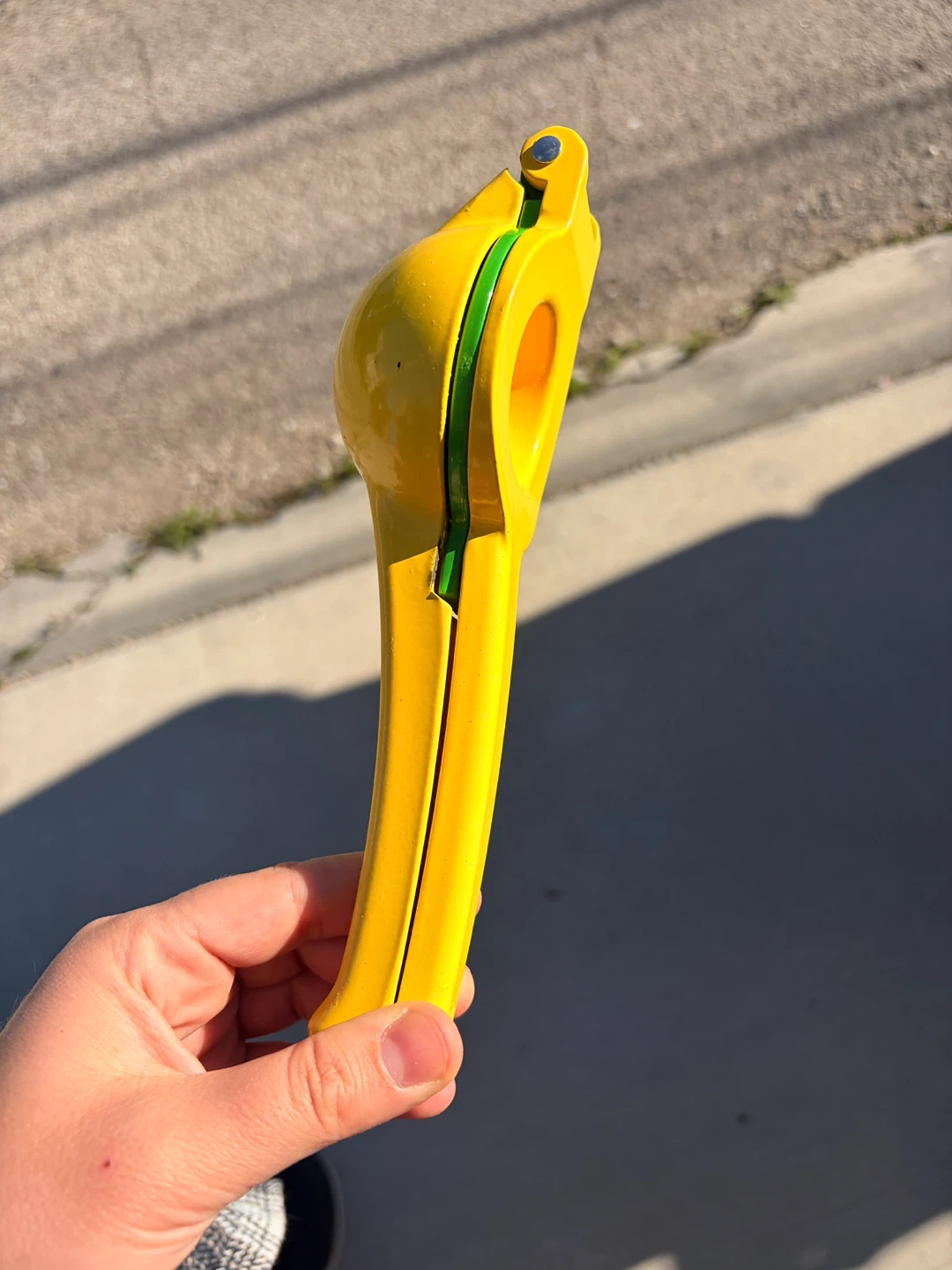 Yellow and Green Manual Citrus Juicer