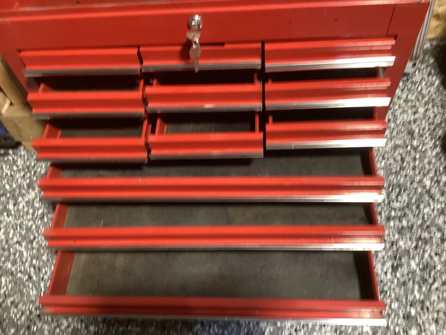 Red Metal Tool Chest with Multiple Drawers