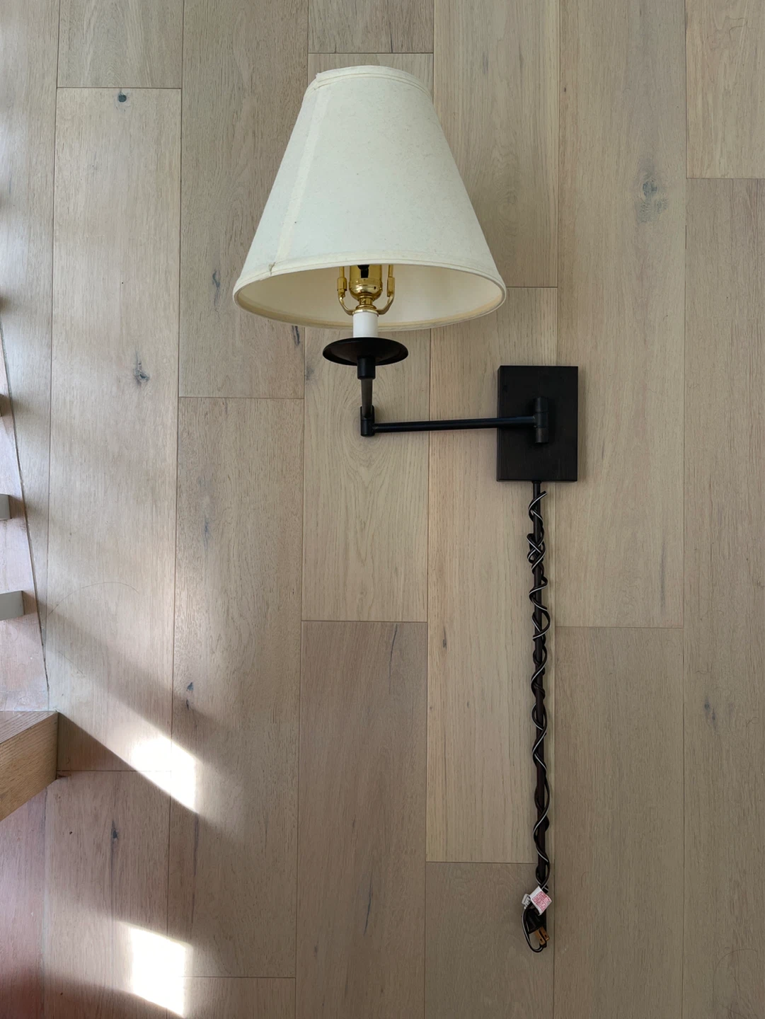 Black Swing Arm Wall Lamp with Cream Shade