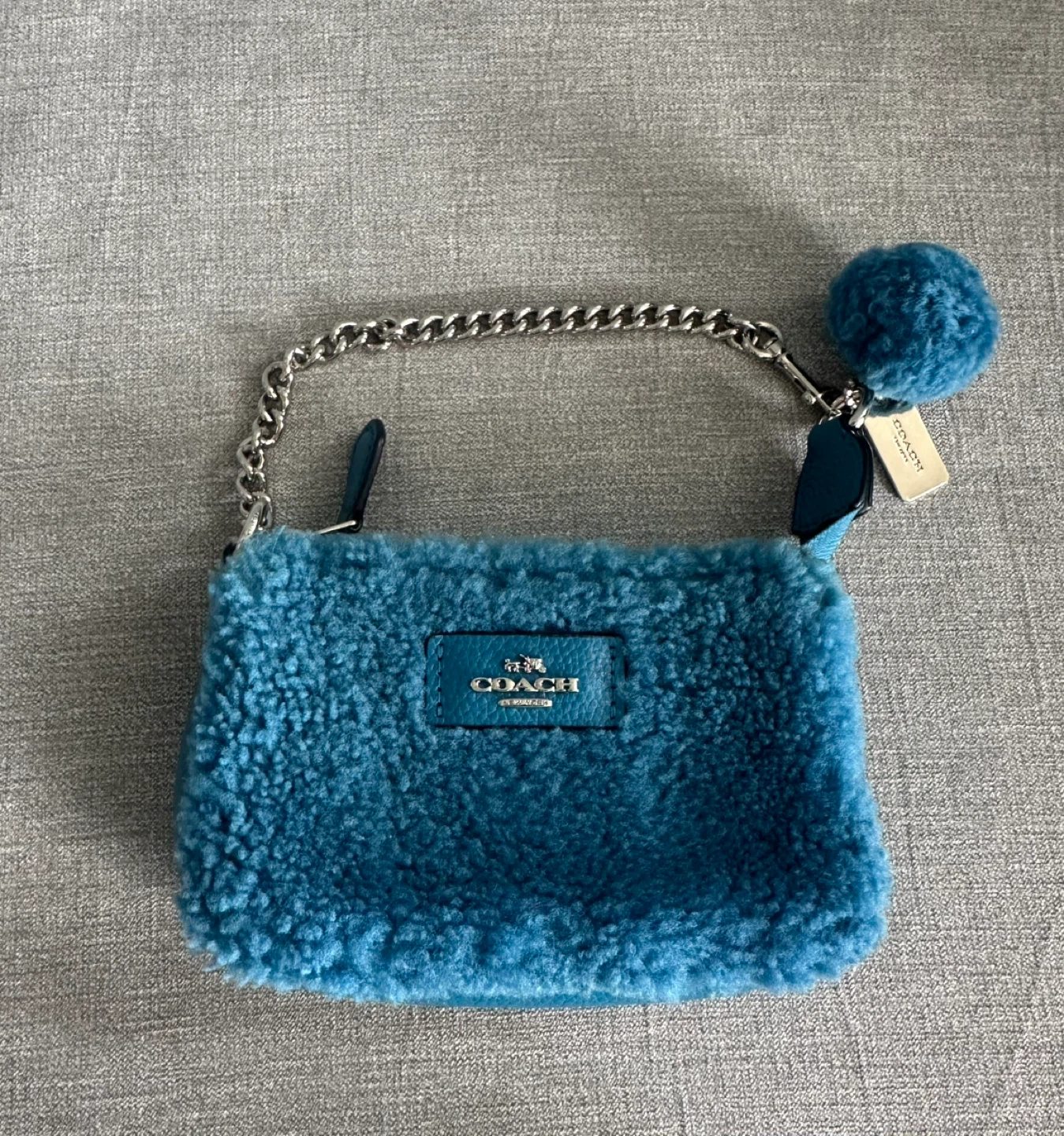 COACH shearling Nolita Wristlet 15