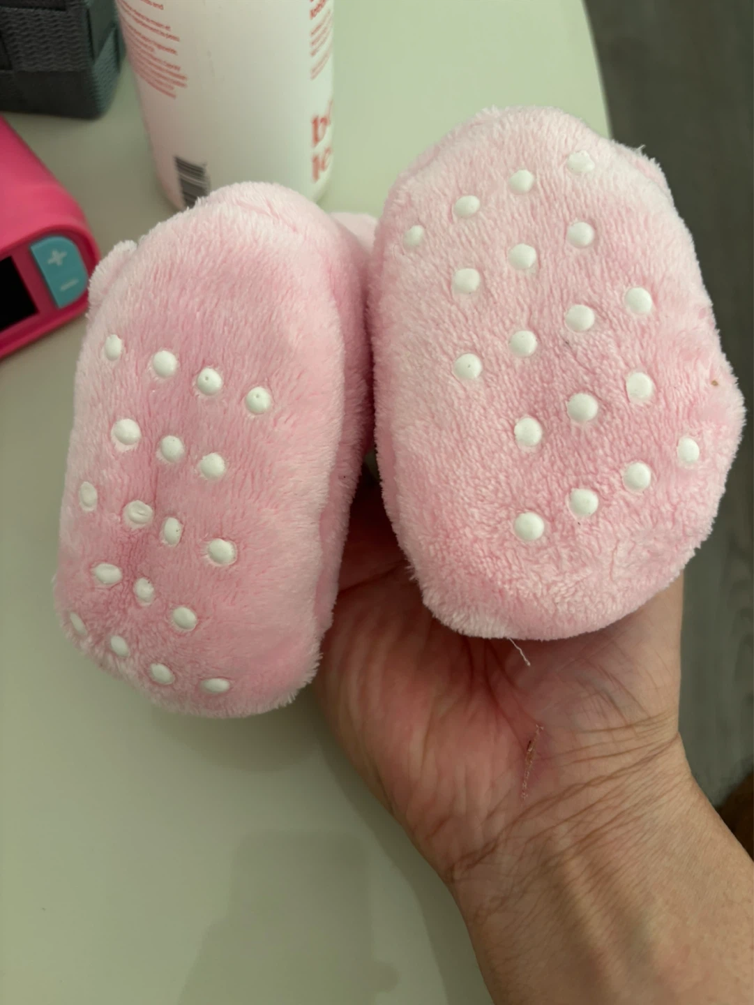 Used Pink fuzzy baby booties with grippy soles - photo 2
