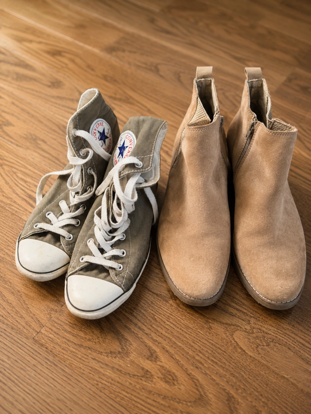 Converse high-top sneakers and beige ankle boots