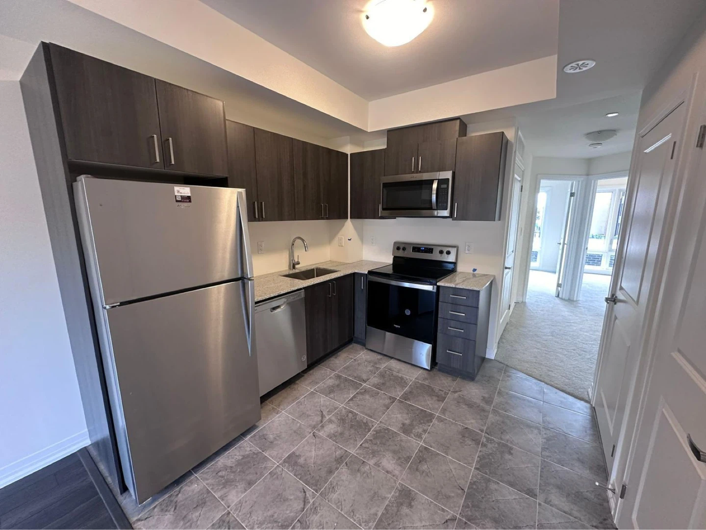Modern Townhouse Kitchen with Stainless Steel Appliances - photo 4
