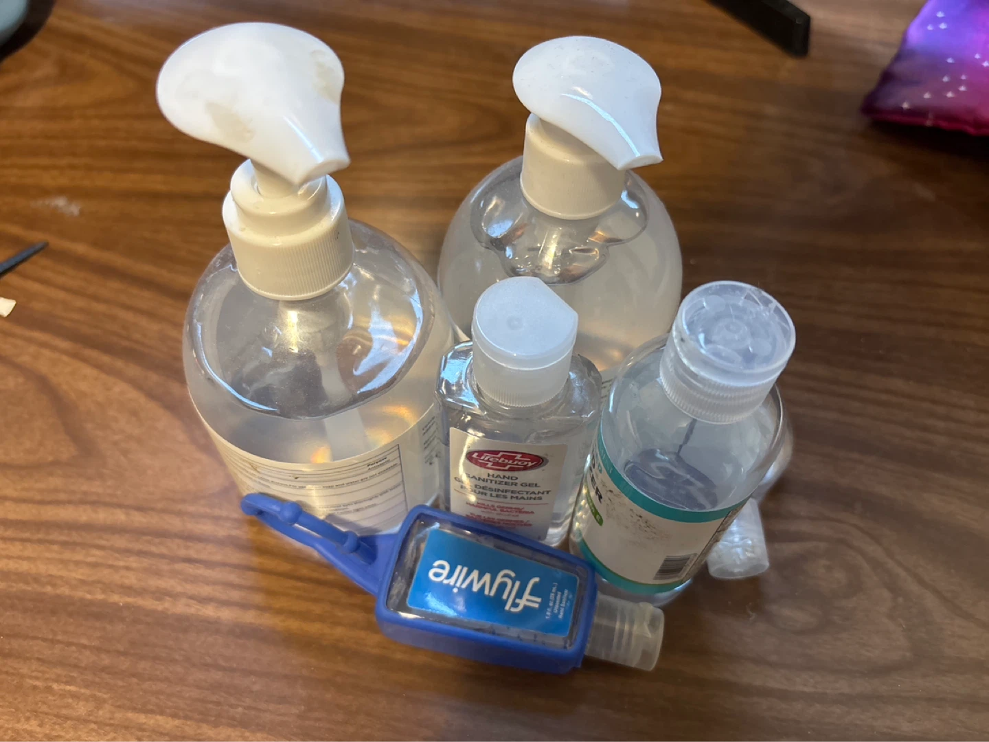 Lot of 4 Hand Sanitizer Bottles with a Flywire Keychain