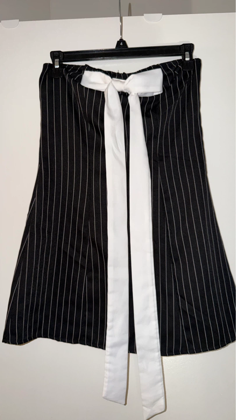 Black and white pinstripe skirt with bow accent
