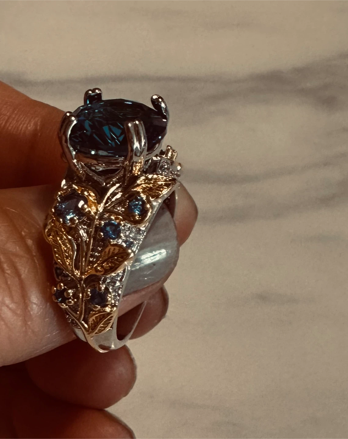 Women's Fashion Ring - Blue Gemstone and Gold Leaf Design