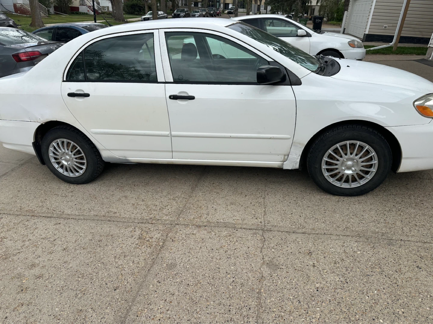 White Toyota Corolla Sedan 2008 Rebuilt status .