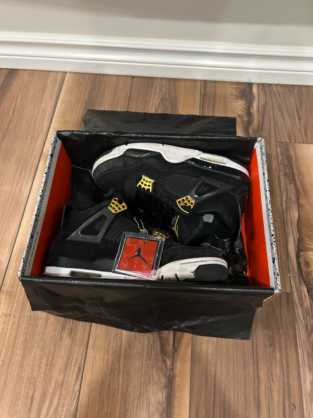 Air Jordan 4 Retro Black Gold Sneakers