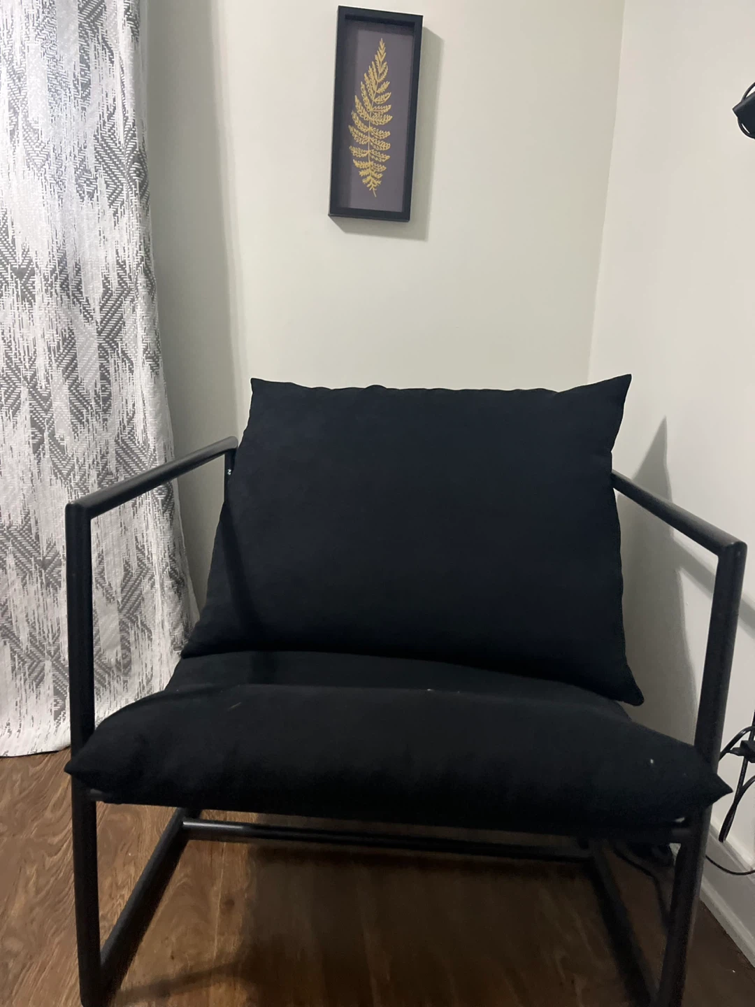 Black Armchair with Accent Pillow