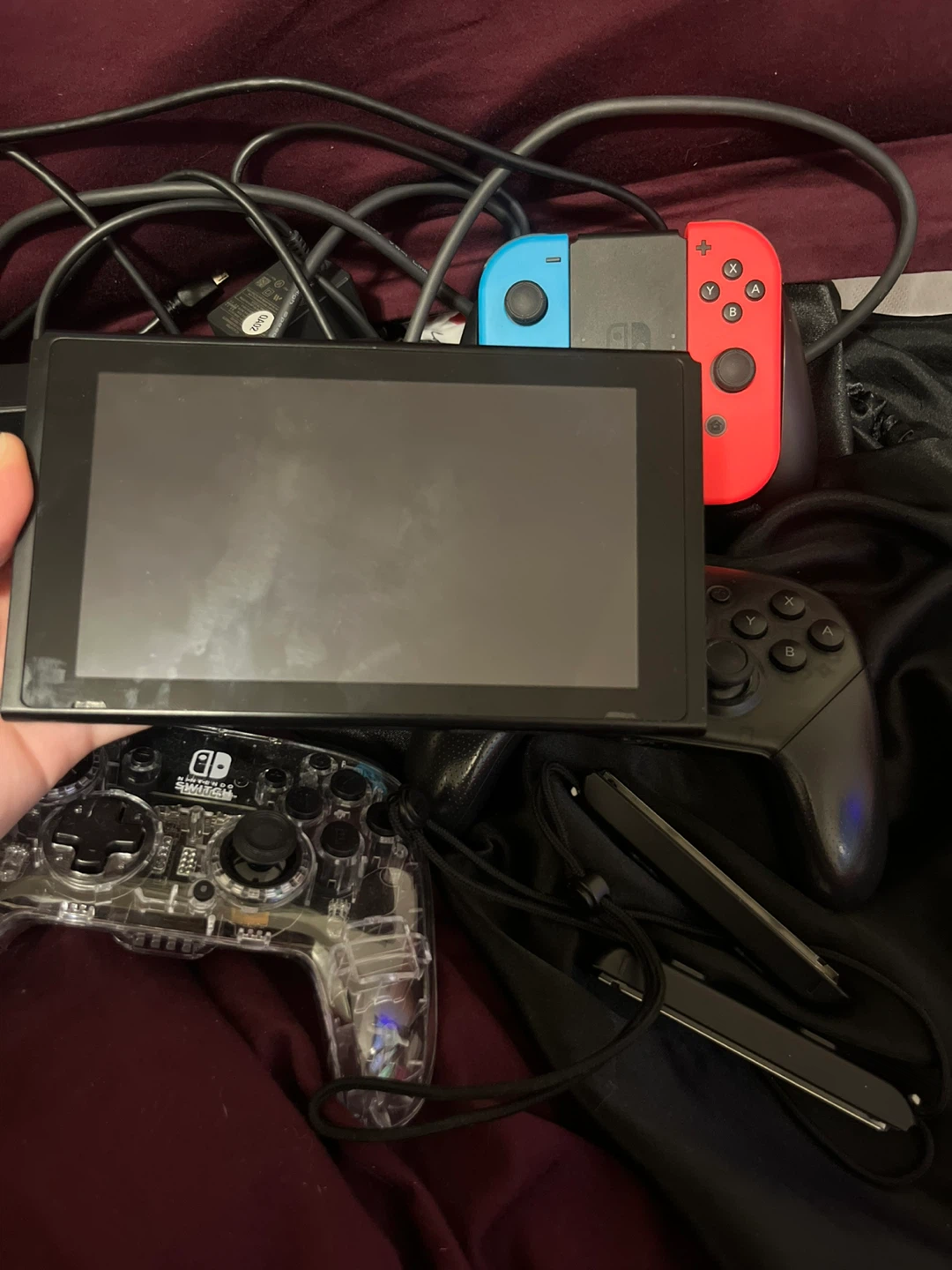nintendo switch console with two controllers - photo 2