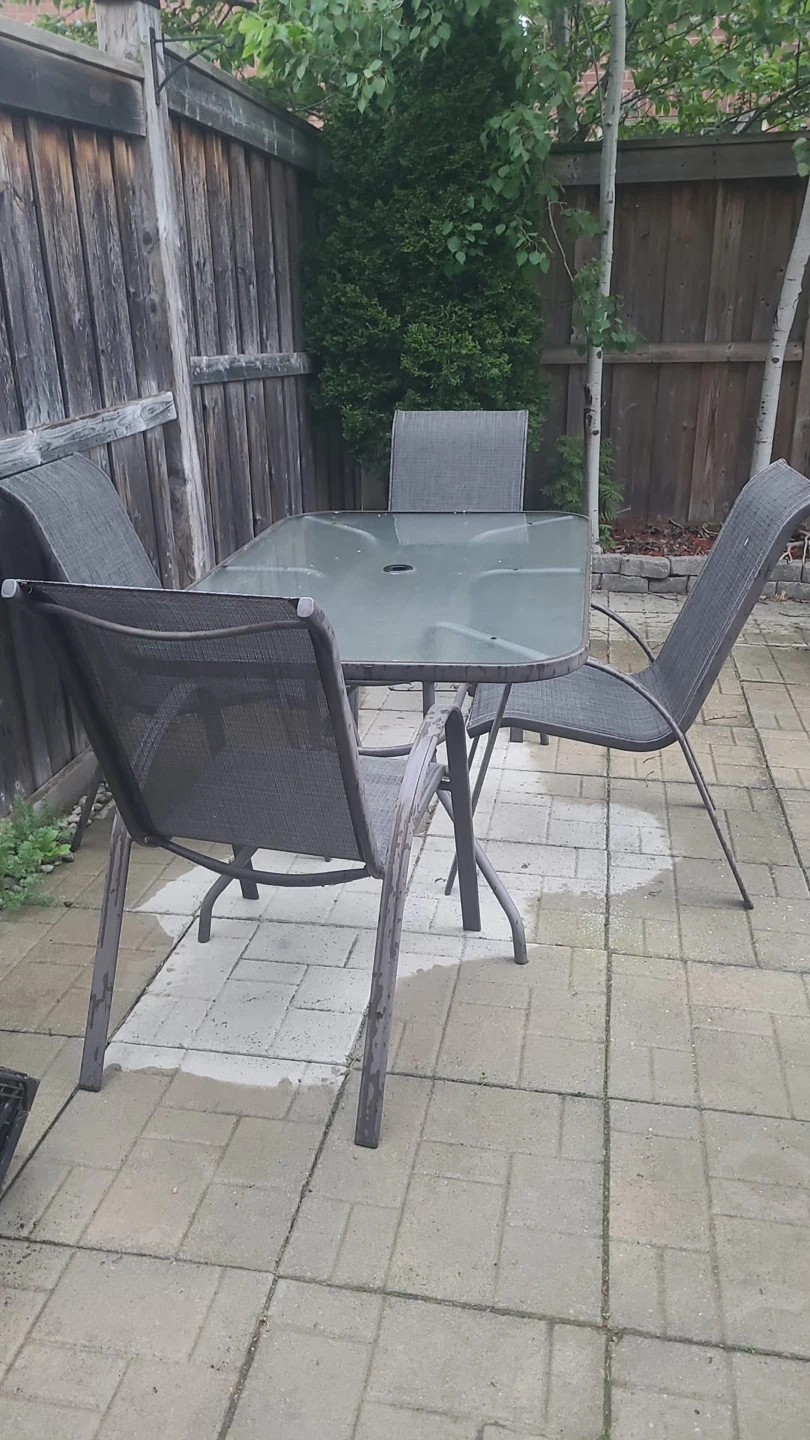 Glass top patio table with 4 chairs